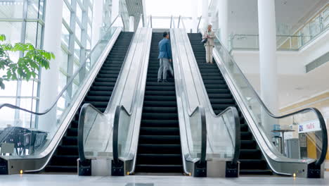 Escalator,-greeting-and-business-people-travel-to