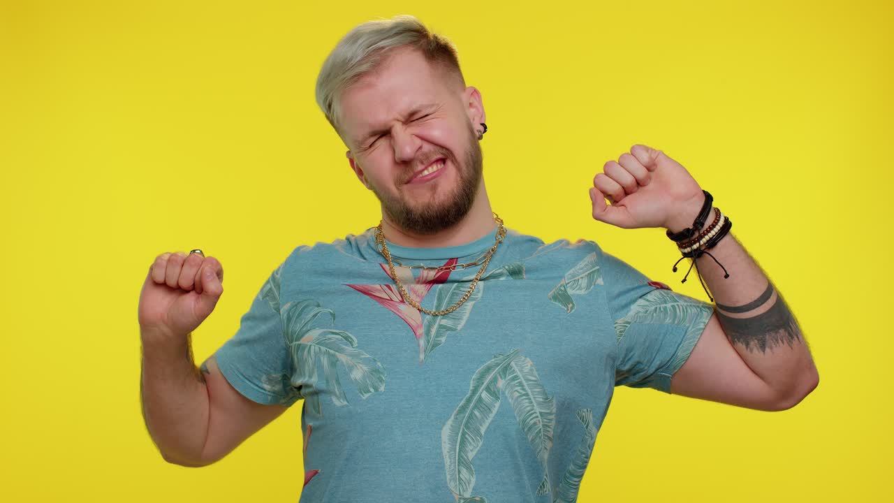 Tired handsome sleepy man yawning, feeling somnolent lazy bored gaping suffering from lack of sleep