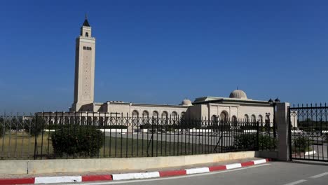 bright day at carthage mosque with clear sky, iconic minaret visible