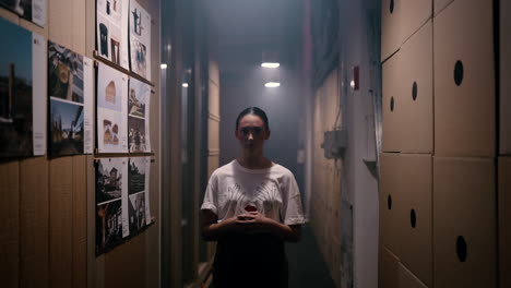 young woman in a design corridor