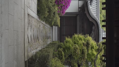 a vertical shot approaching an ancient japanese temple