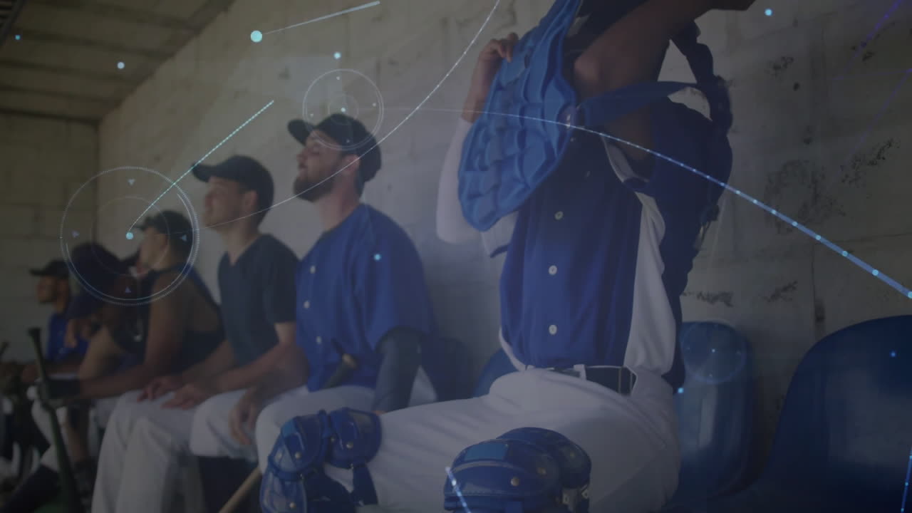male players sitting in baseball dugout, displaying animated sports analytics charts above bats