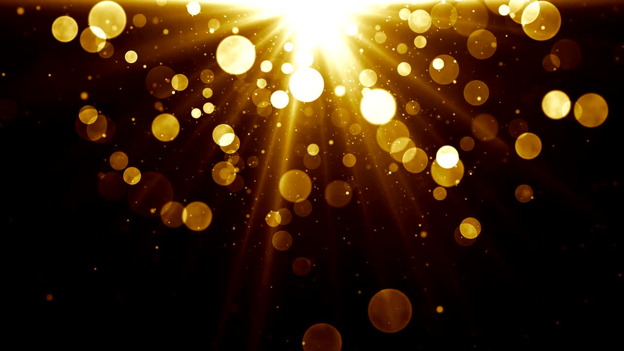 축하와 축하를 위한 추상적인 화려한 배경: 황금색 반이는 입자가 떨어지는 위쪽의 별 폭발.