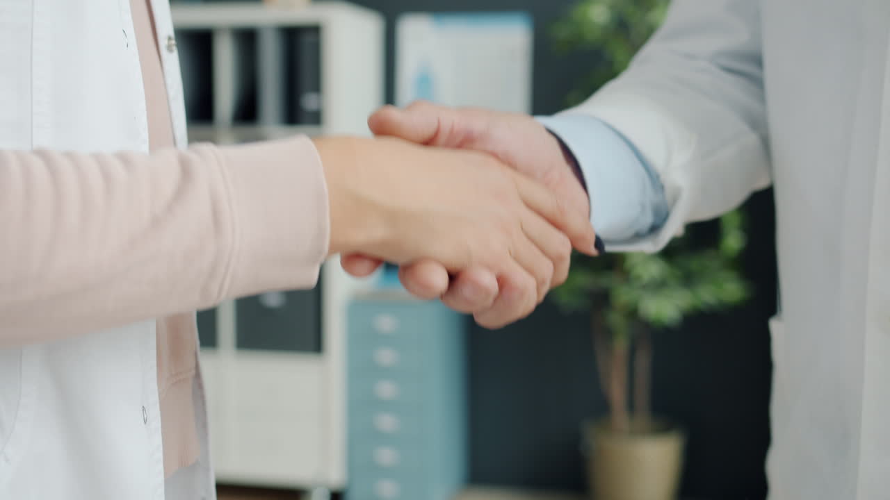 Doctor and Nurse Handshake