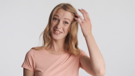 caucasian woman nodding on camera.