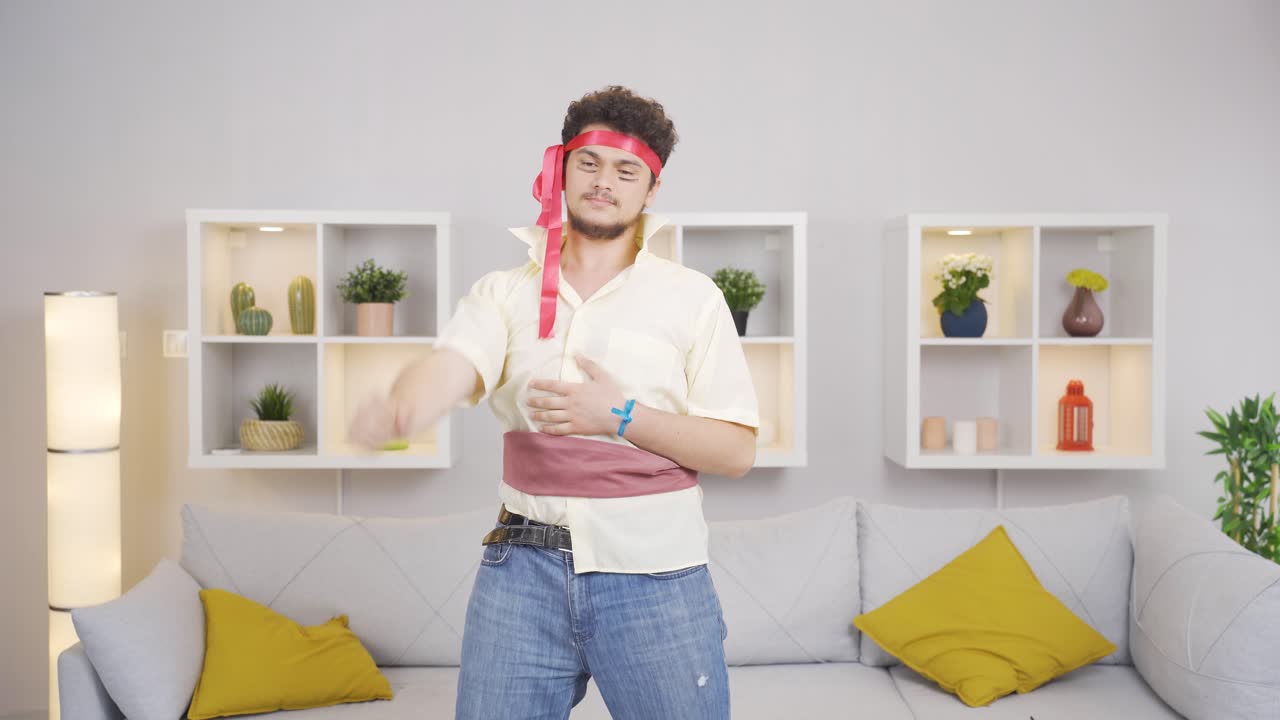 Funny sports man injures his arm. A man who doesn't understand sports.