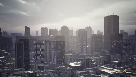view of a modern city skyline under cloudy weather in the late afternoon