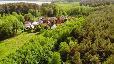 small village with vibrant green lush foliage in styporc, chojnice county, pomeranian voivodeship in northern poland