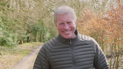 Portrait-Of-Senior-Man-On-Walk-In-Countryside-Exercising-During-Covid-19-Lockdown