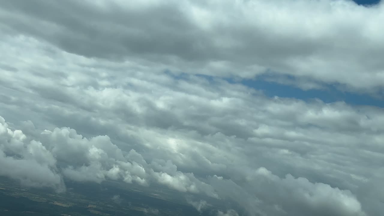POV pilot perspective of a dramatic winter sky plenty of clouds