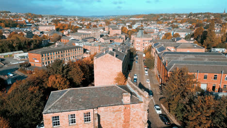 aerial drone footage of the english market town centre of dewsbury in west yorkshire in the uk showing the historical town centre and the dewsbury townhall