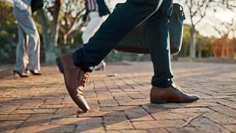 business people walking on a brick path