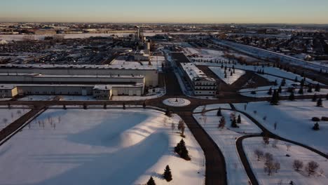 The-revealing-shot-of-the-CPKC-Head-Office-Building-in-Calgary,-covered-in-snow