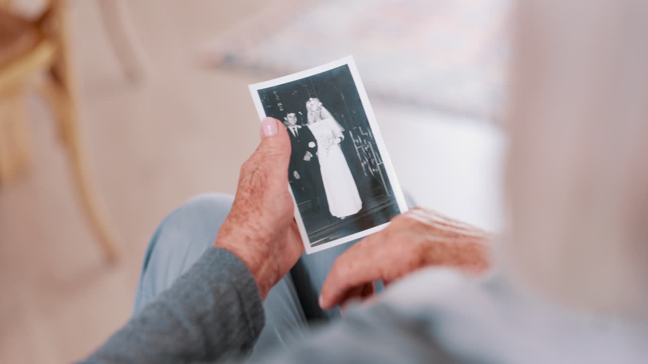 Photograph, memory and old woman in home remember