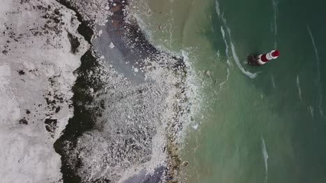 Beachy-Head-Lighthouse-in-English-Channel,-aerial-bird's-eye-view