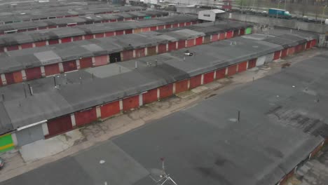 bird eye from the top view of old red metal door car garage area outside the city