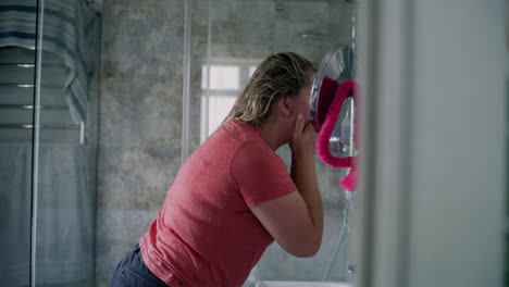 woman getting ready in the bathroom