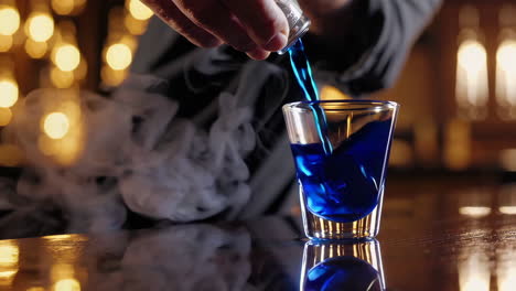 pouring a blue shot at a bar
