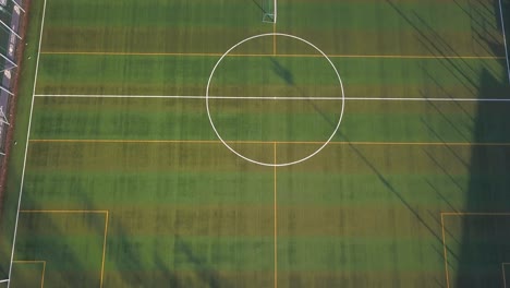 aerial of football pitch with artificial green turf