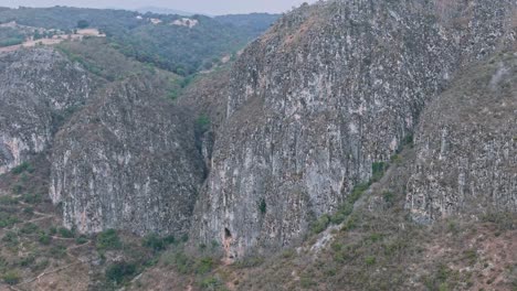 twin cliffs at santiago apoala, oaxaca, with deep canyon cuts and dry terrain
