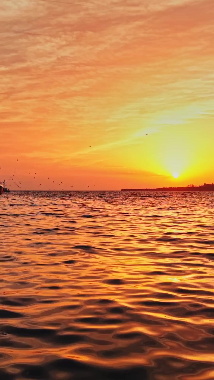 Sunset over the harbor in Nesebar, Bulgaria with colorful sky