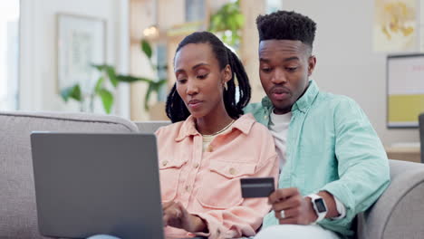 Black-couple,-laptop-and-credit-card-in-online