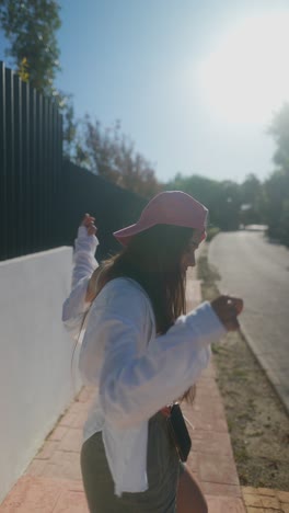 woman walking outdoors in stylish outfit