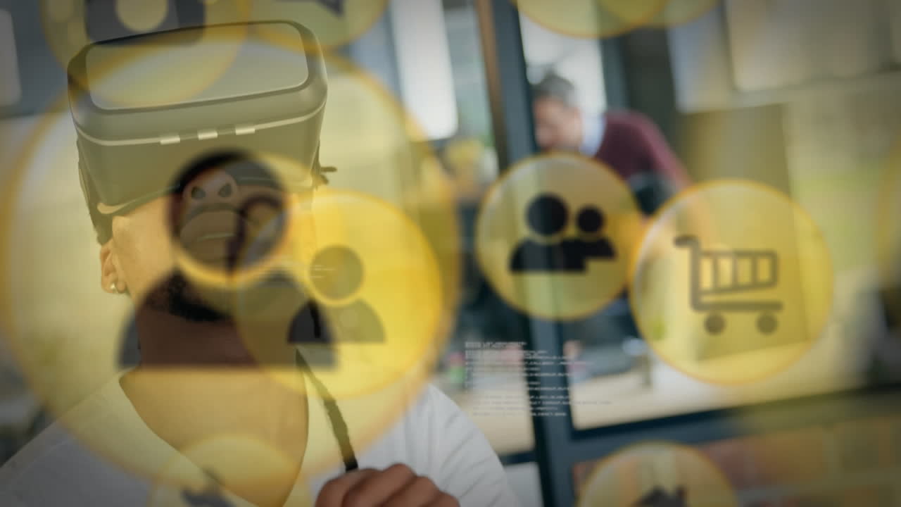 Multiple digital icons floating against african american businessman wearing vr headset at office