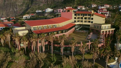 aerial view of a hotel resort complex in a coastal town