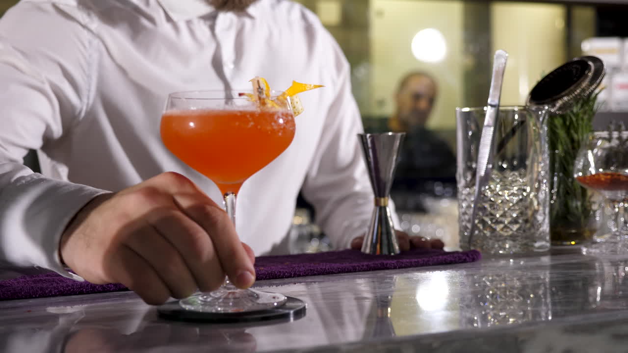 Bartender preparing a cocktail at the bar