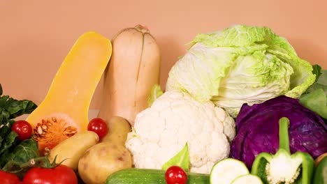 assorted vegetables displayed on a white background