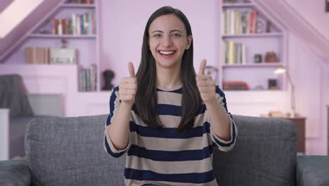 Happy-Indian-girl-doing-Thumbs-up