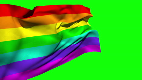 bandera del arco iris soplando contra la pantalla verde