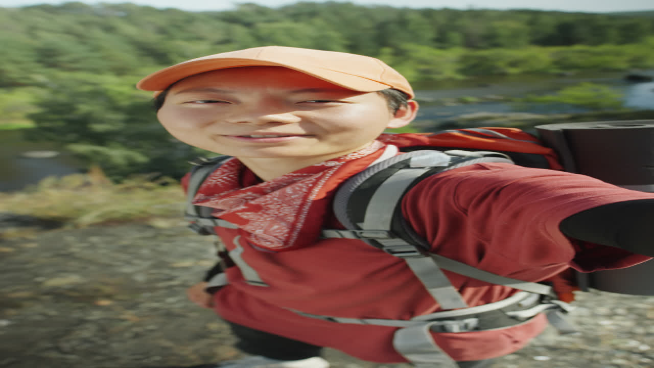 Asian Travel Blogger on Mountain Peak