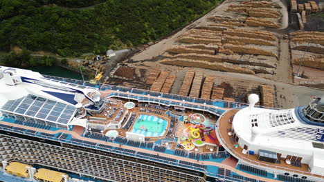 Swimming-Pool-On-Deck-Of-Cruise-Ship-Docked-In-Picton-Harbor,-New-Zealand