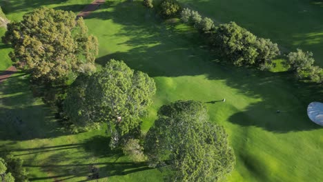 Aerial-view-over-the-green-grasses-of-Australia's-Royal-Perth-Golf-Club