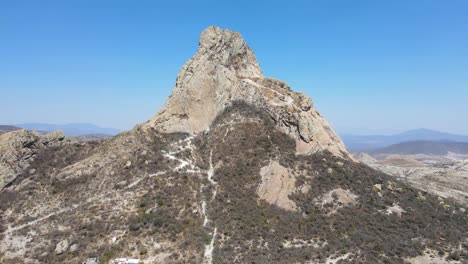 La-Peña-de-Bernal-is-the-third-largest-monolith-in-the-world,-located-in-the-town-of-Bernal-which-is-in-the-municipality-of-Ezequiel-Montes-in-the-state-of-Querétaro,-Mexico