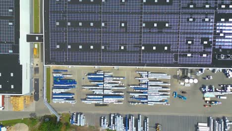 Aerial-view-of-modern-storage-warehouse-with-solar-panels-on-the-roof