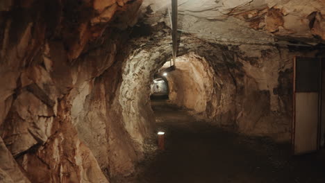 Slow-motion-panning-shot-of-underground-cold-war-tunnel