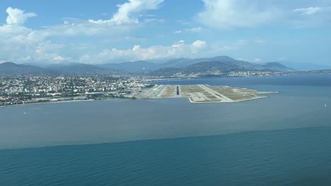 approaching to nice airport, france, in the french riviera, in splendid sunny summer afternoon