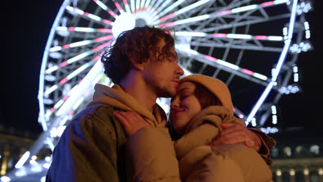 affectionate couple embracing in city center. woman and man enjoying date.