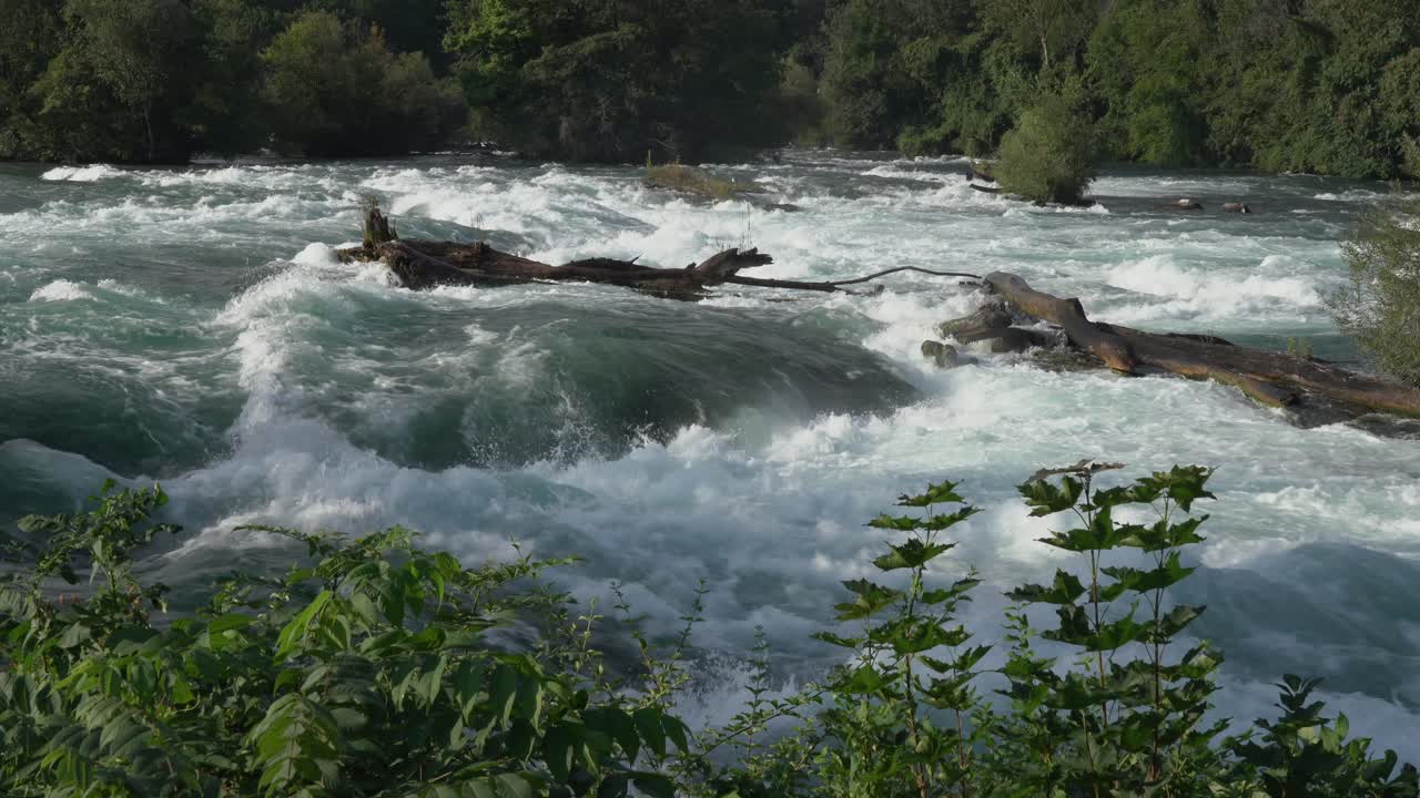 The danger of the fast flowing rapids on the Niagara River above the falls
