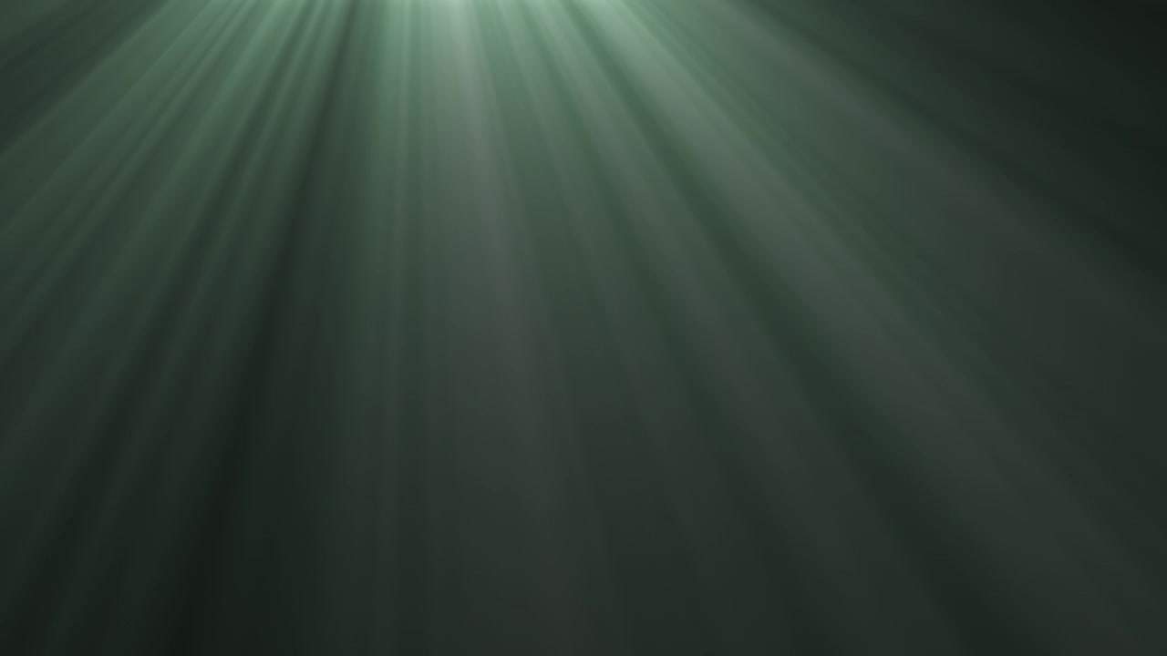 Raios de Luz Verde Suaves Brilhando para Baixo