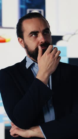 vertical video conceptual image of a businessman in a digital environment focused on metrics