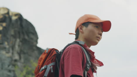 asian female tourist trekking in mountains