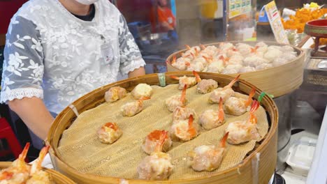 freshly steamed shrimp dumplings at a food stall