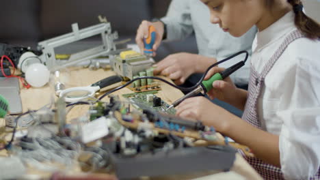 two young classmates doing school project together