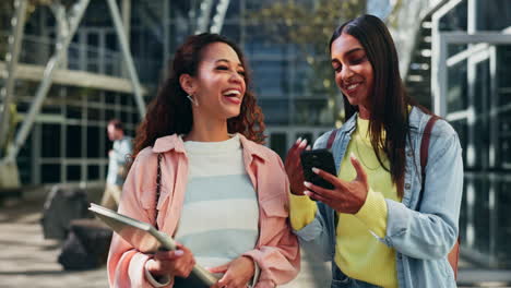 Girl-friends,-phone-and-happy-on-university-campus