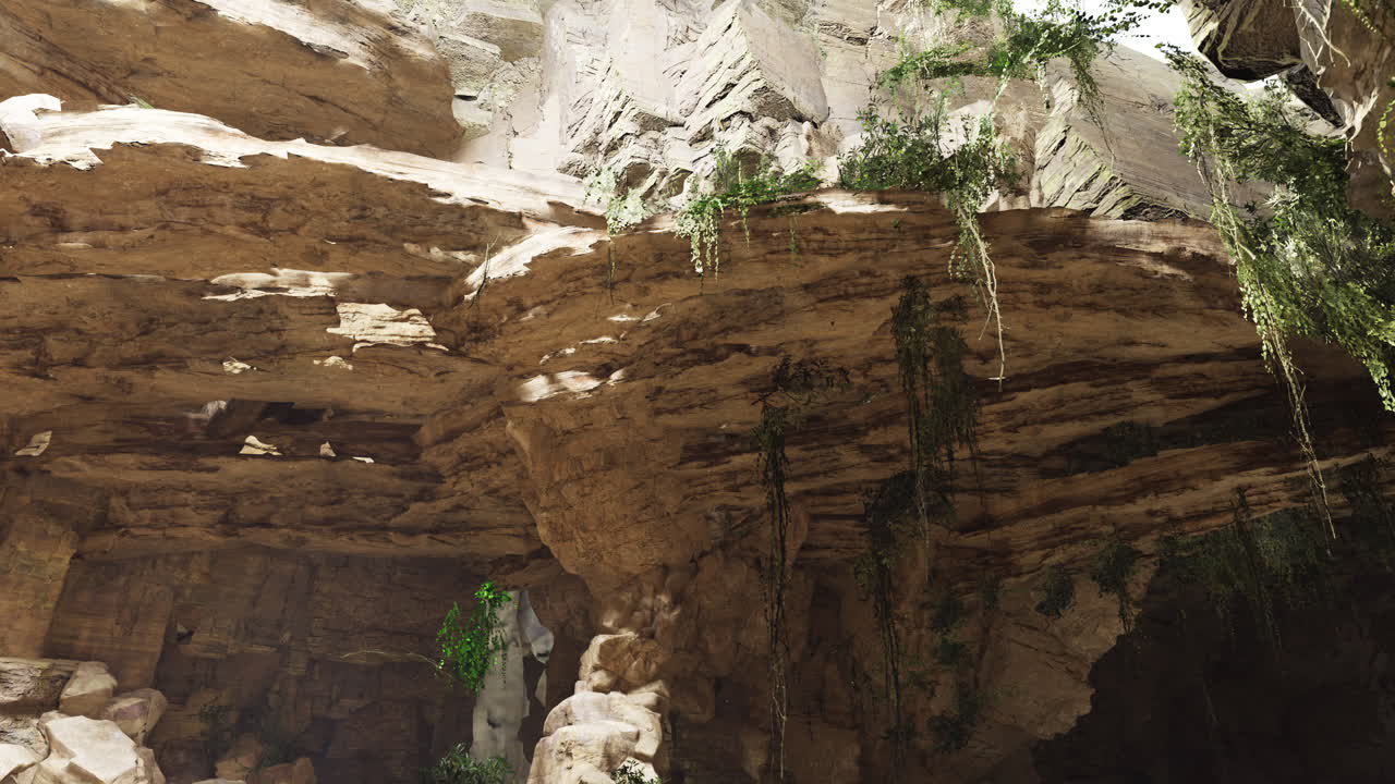 Rocky cave with lush greenery in a natural setting during daylight hours