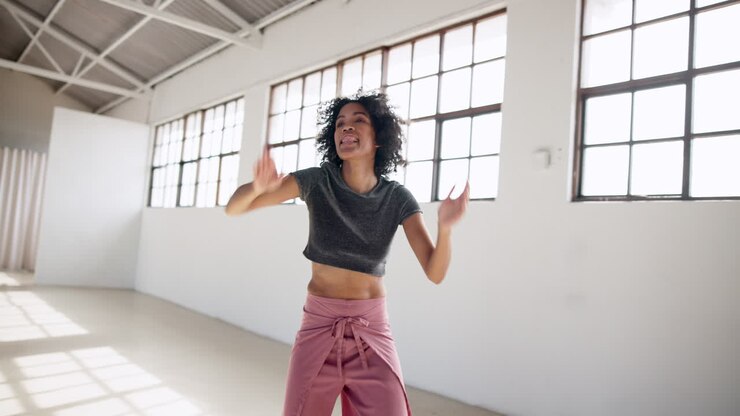 Dance, art and energy with a woman in a studio